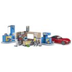 Station service et lave-auto avec véhicule