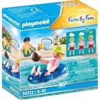 Familiy fun-vacancier avec coups de soleil et bouée