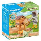 Country - apicultrice avec ruche
