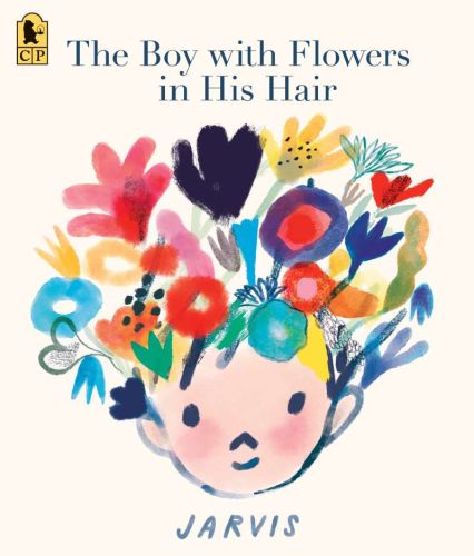 The boy with flowers in his hair