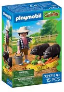 Agriculteur avec cochons